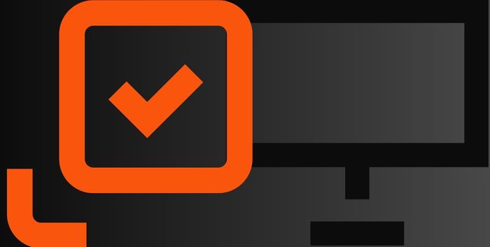&Iacute;cone de monitor com s&iacute;mbolo de tarefa conclu&iacute;da em laranja e preto, representando como criar um agente de IA